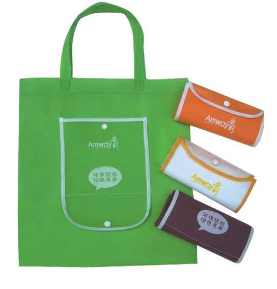 Wholesale green color folding non woven bag for shopping