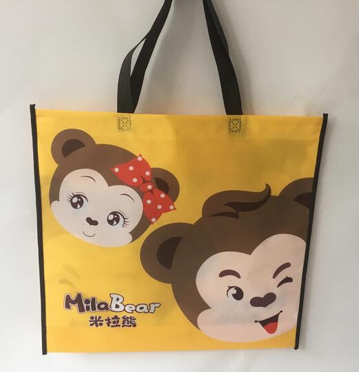 Wholesale yellow color non woven bag with handle