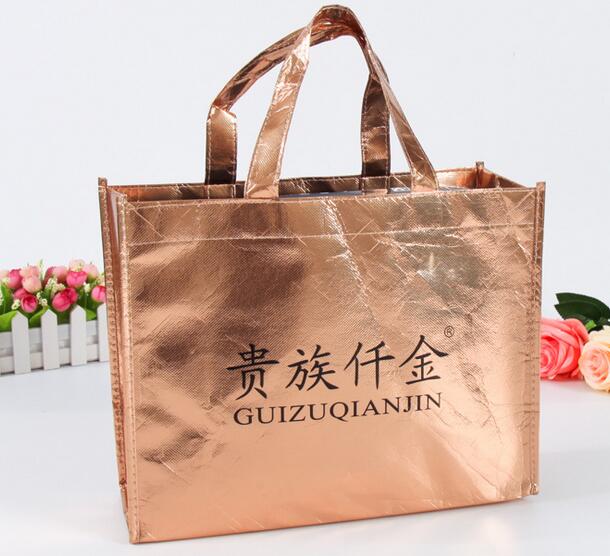 Wholesale gold color non woven bag with customized logo