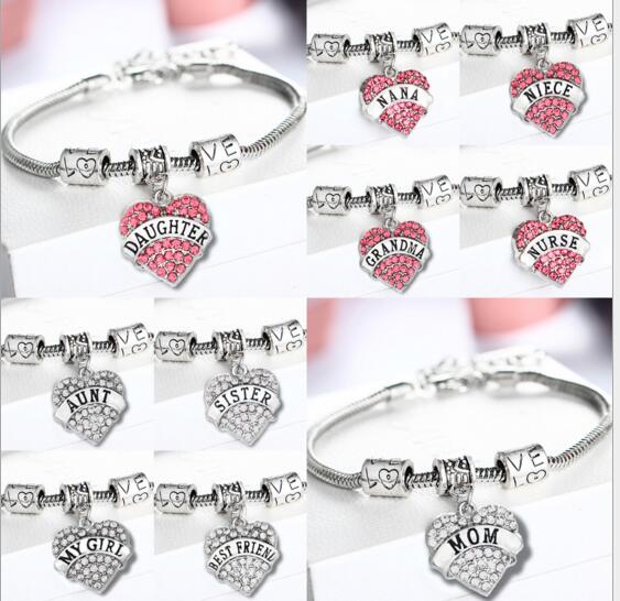 Promotional cheap style daughter pink color heart shape bracelet