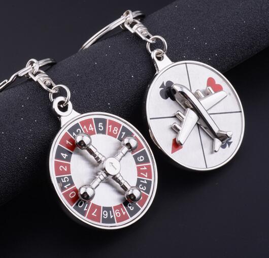 Creative Russian turntable key pendant can rotate the plane compass set keychain
